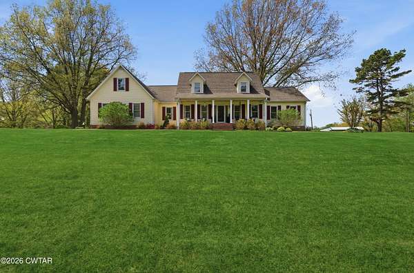 9.5 Acres of Land with Home for Sale in Gadsden, Tennessee