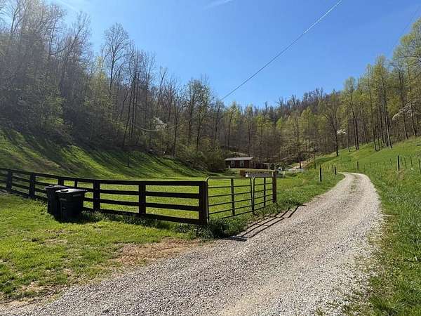 23 Acres of Land with Home for Sale in Hagerhill, Kentucky