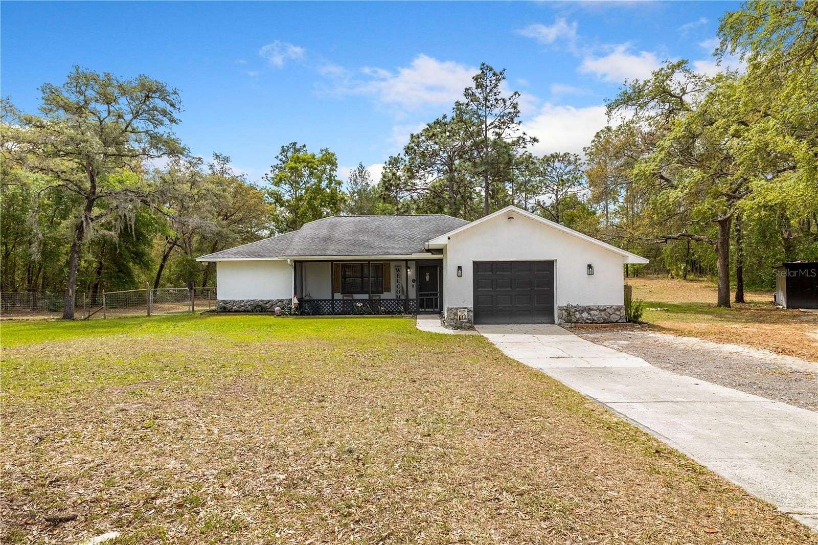 1.8 Acres of Land with Home for Sale in Spring Hill, Florida