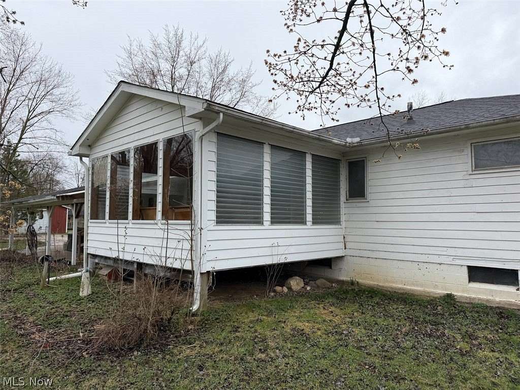 5.27 Acres of Land with Home for Auction in Middlefield, Ohio