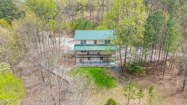 7.69 Acres of Land with Home for Sale in Hot Springs, Arkansas