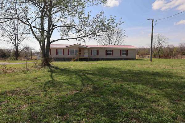 5 Acres of Land with Home for Sale in Romance, Arkansas