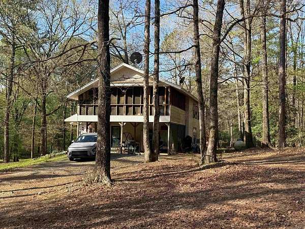 9.83 Acres of Land with Home for Sale in Vandervoort, Arkansas