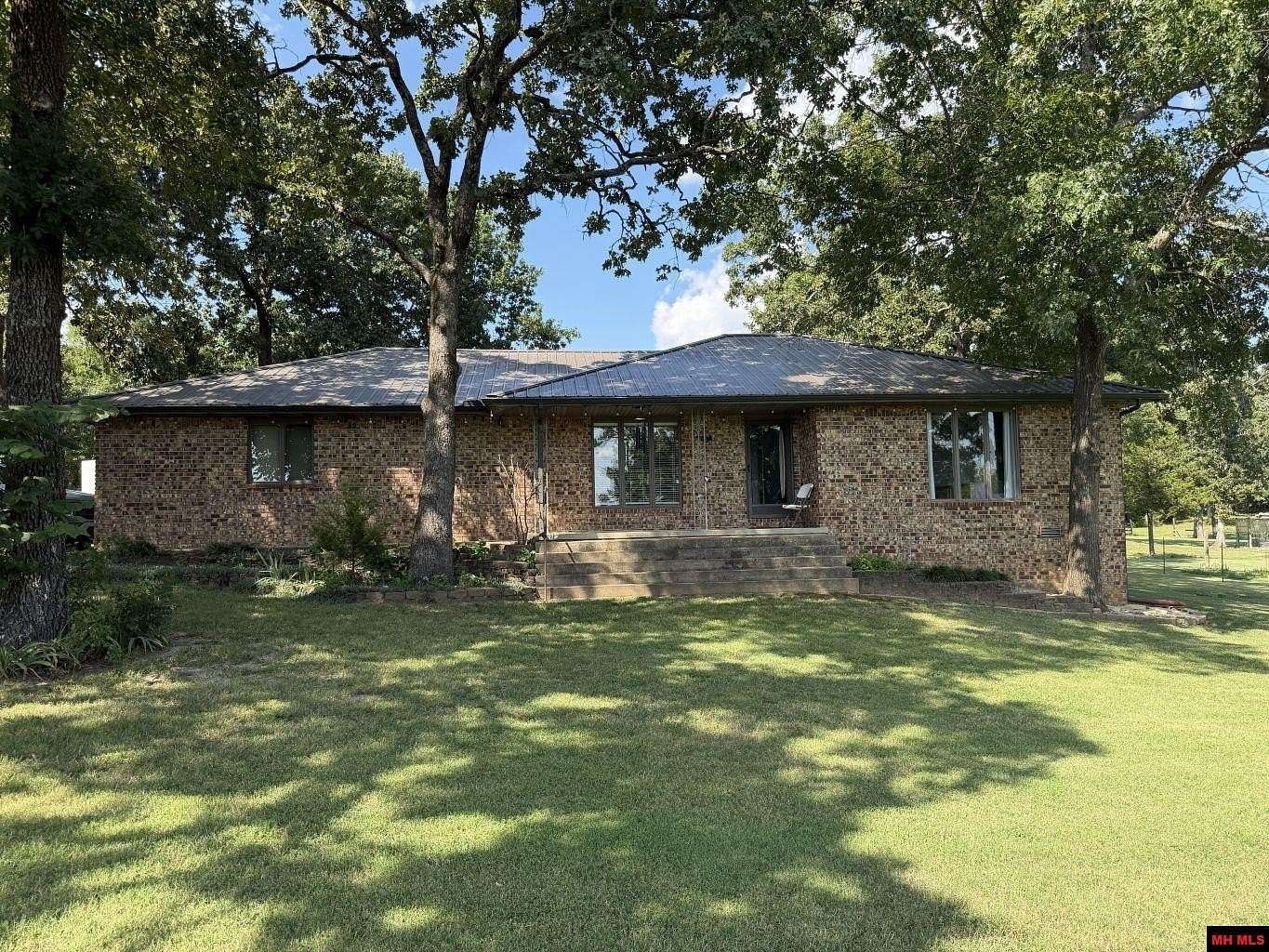 10 Acres of Land with Home for Sale in Gassville, Arkansas