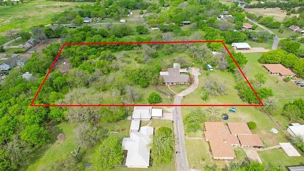 4 Acres of Land with Home for Sale in Tom Bean, Texas
