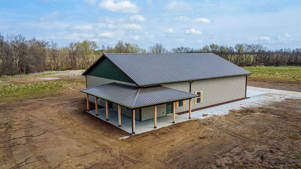 7.7 Acres of Land with Home for Sale in Centralia, Missouri