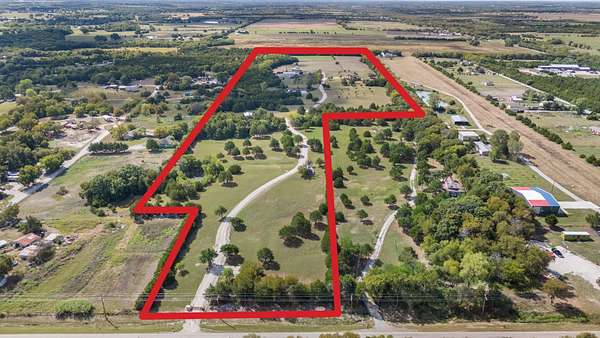 34.8 Acres of Recreational Land with Home for Sale in Leonard, Texas