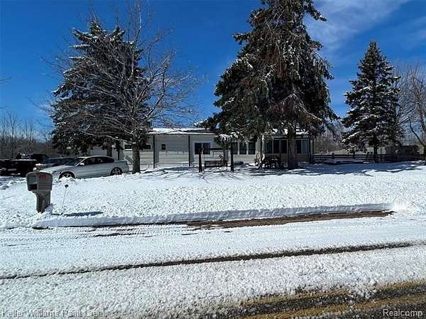 1.89 Acres of Land with Home for Sale in Marion Township, Michigan