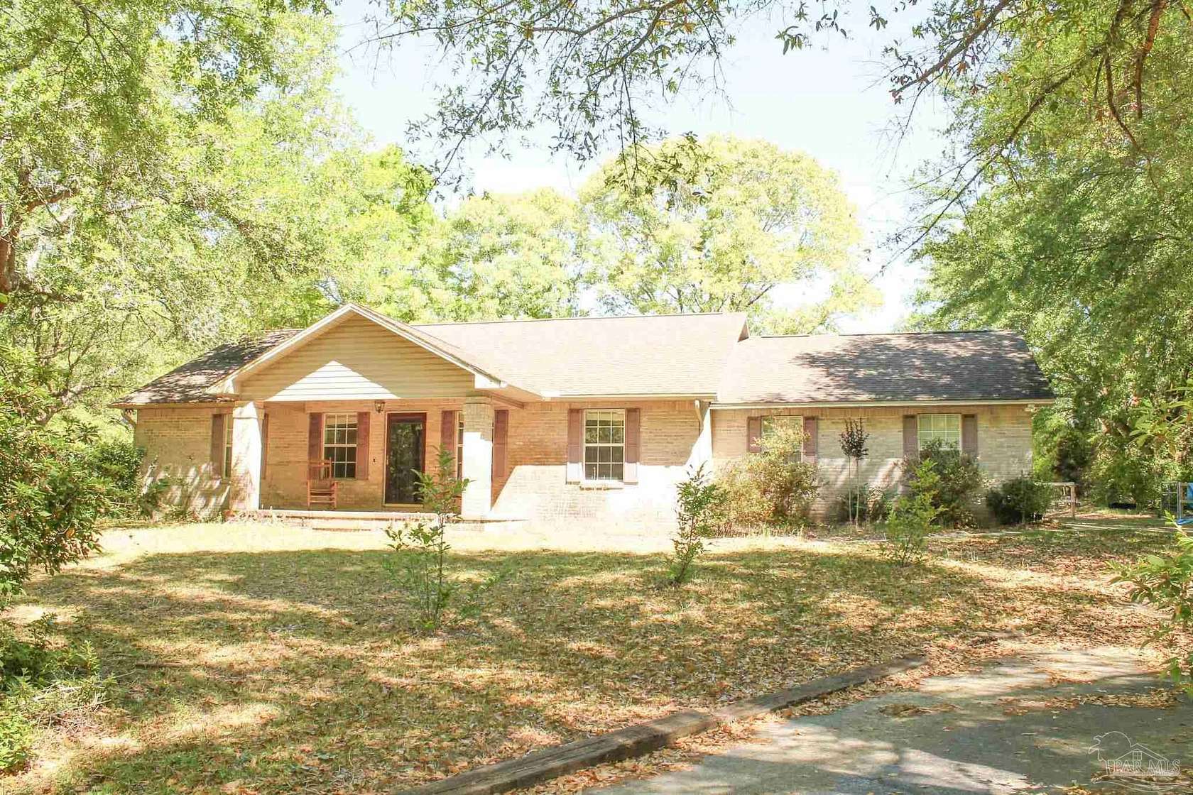 5.82 Acres of Land with Home for Sale in Baker, Florida