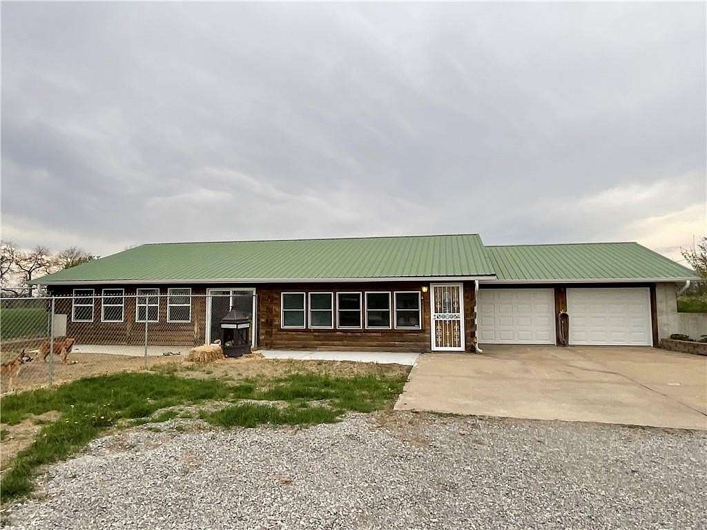8.7 Acres of Land with Home for Sale in Lathrop, Missouri