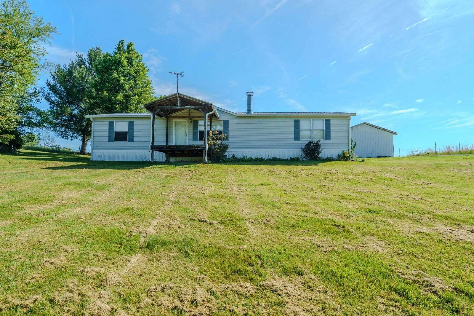 7.6 Acres of Land with Home for Sale in Talbott, Tennessee