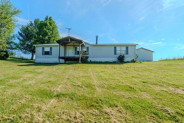 7.6 Acres of Land with Home for Sale in Talbott, Tennessee