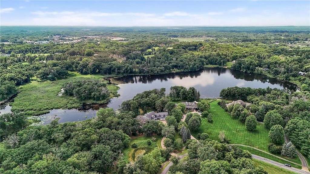 6.48 Acres of Land with Home for Sale in Gem Lake, Minnesota