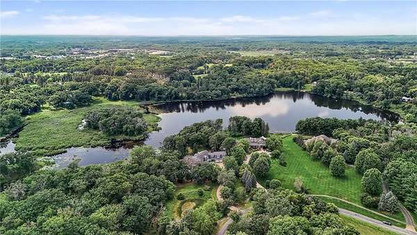 6.48 Acres of Land with Home for Sale in Gem Lake, Minnesota