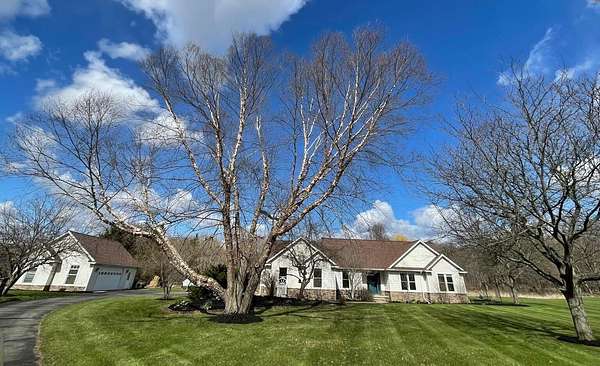 2 Acres of Land with Home for Sale in Grass Lake, Michigan