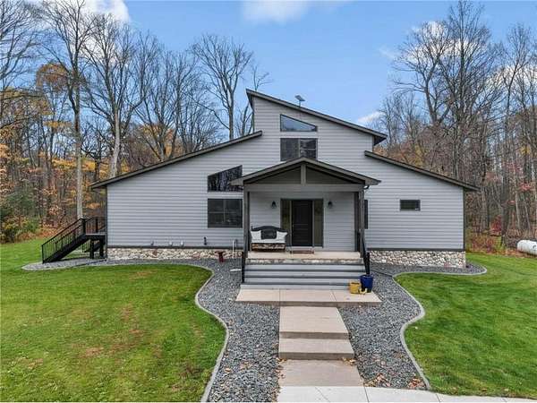 20 Acres of Recreational Land with Home for Sale in Center City, Minnesota