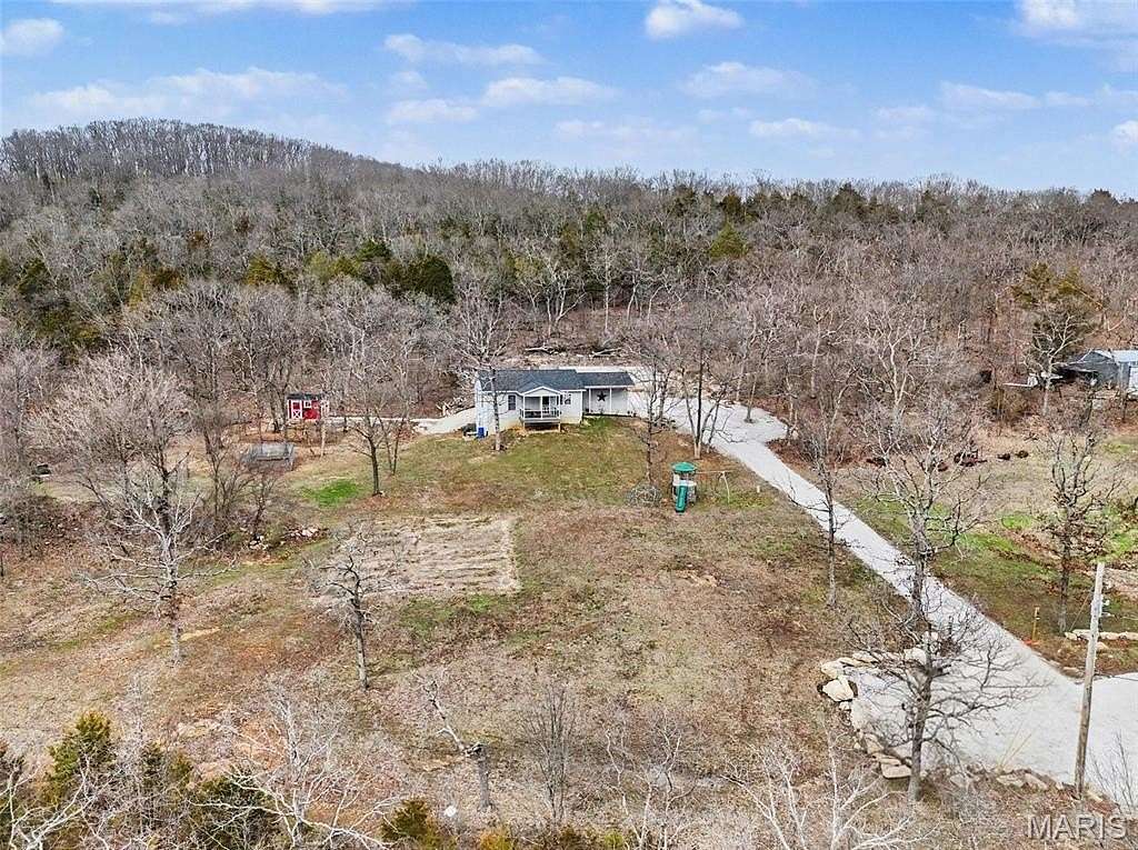 3 Acres of Land with Home for Sale in House Springs, Missouri