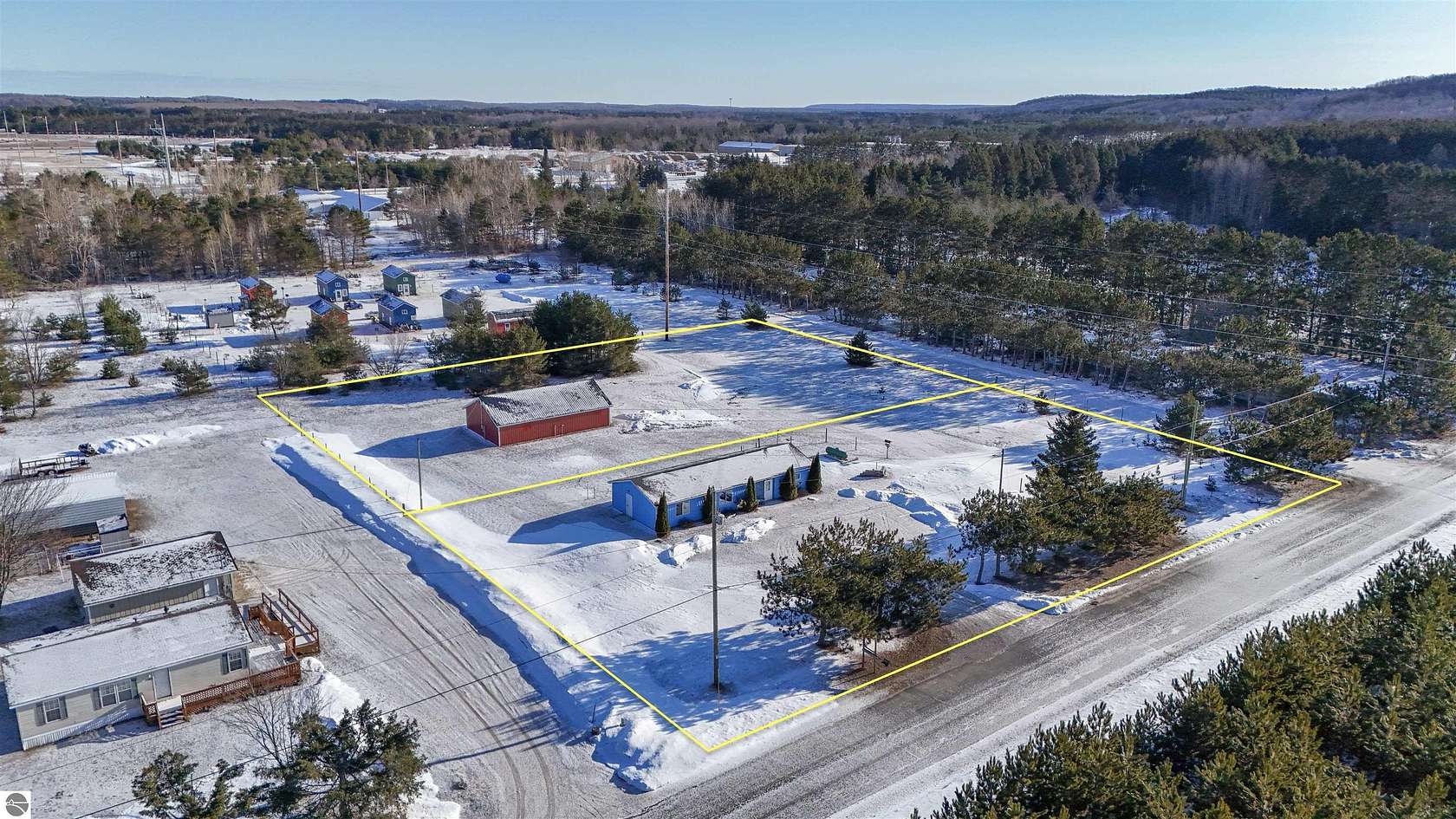 2.5 Acres of Improved Mixed-Use Land for Sale in Mancelona, Michigan