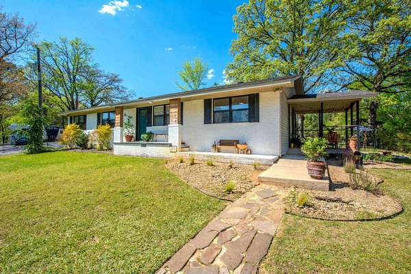 1.76 Acres of Land with Home for Sale in Benton, Arkansas