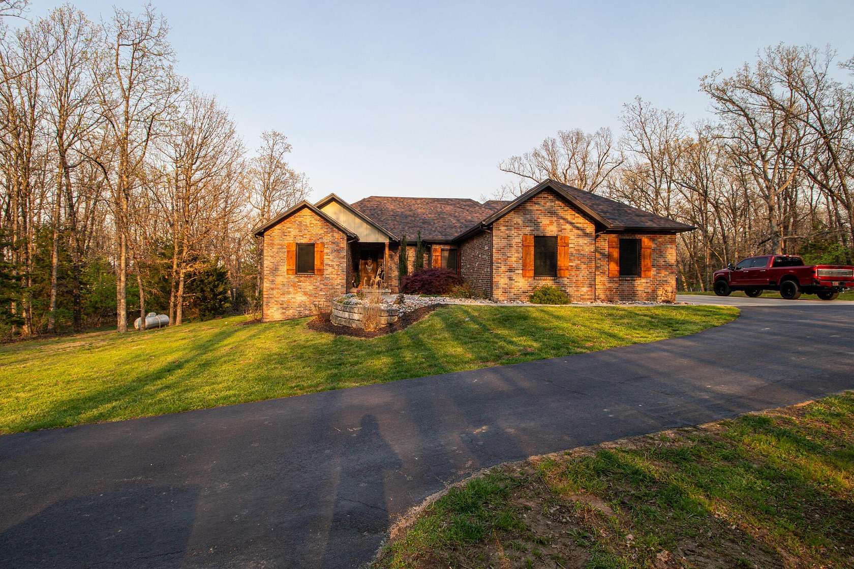 11.1 Acres of Land with Home for Sale in Fair Grove, Missouri