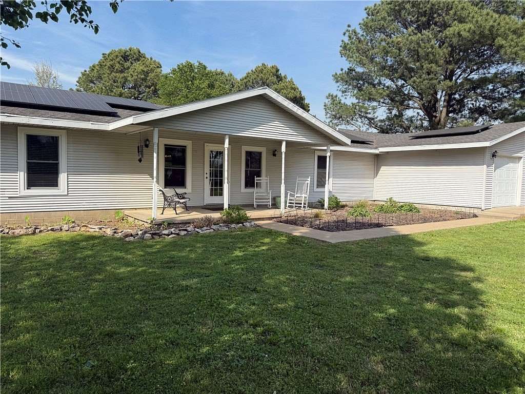 7 Acres of Land with Home for Sale in Gentry, Arkansas