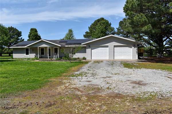 7 Acres of Land with Home for Sale in Gentry, Arkansas