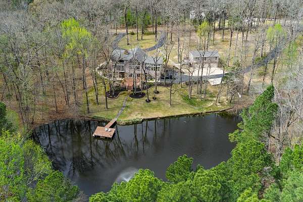 6.73 Acres of Land with Home for Sale in Eads, Tennessee