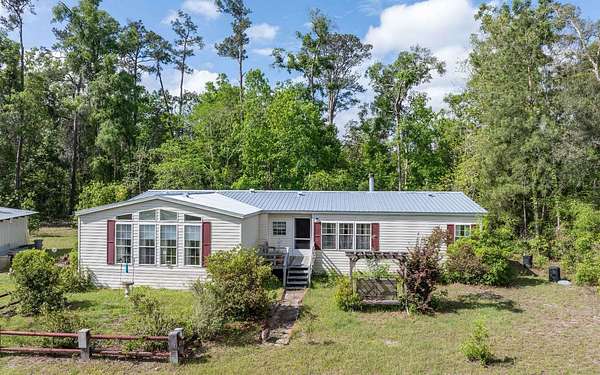 9 Acres of Land with Home for Sale in Live Oak, Florida