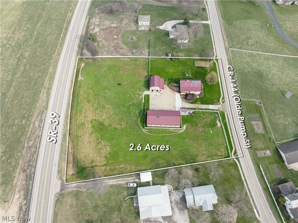 2.6 Acres of Land with Home for Auction in Sugarcreek, Ohio