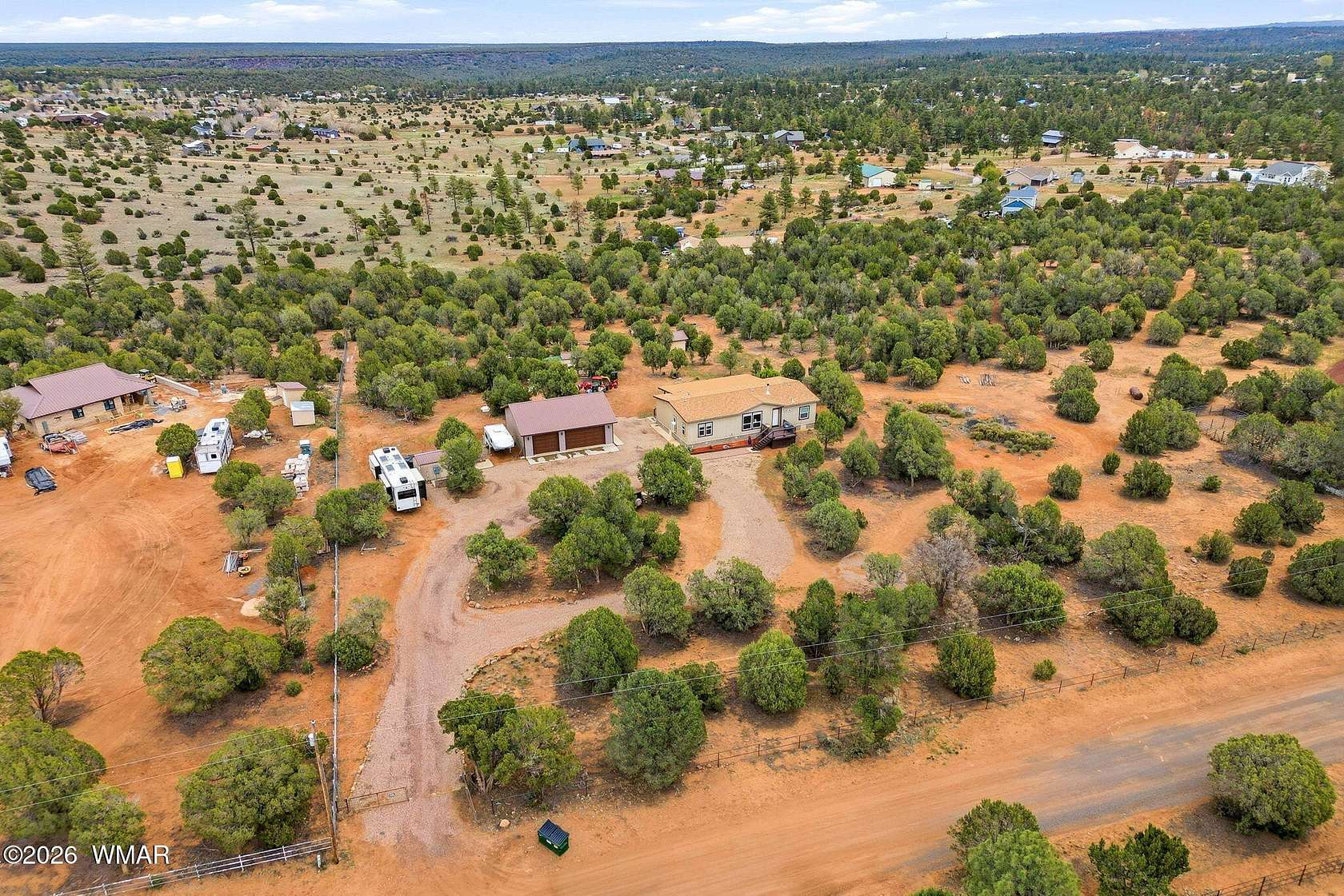 5.12 Acres of Land with Home for Sale in Show Low, Arizona