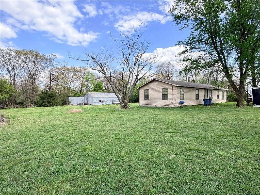5 Acres of Land with Home for Sale in Gentry, Arkansas