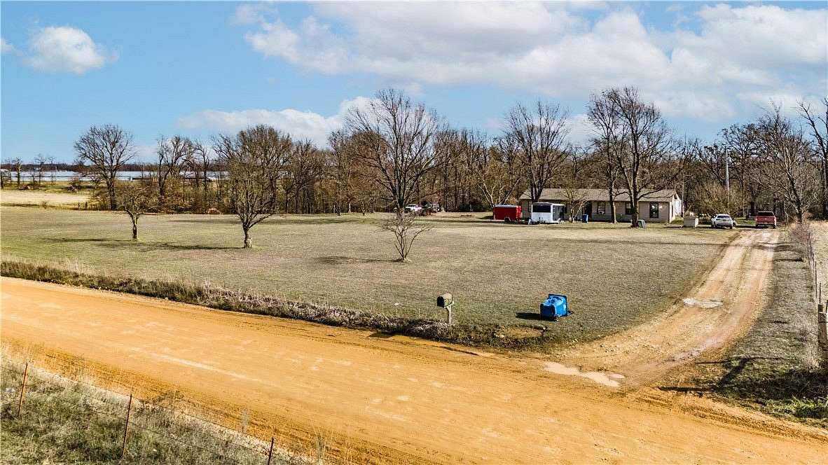 5 Acres of Land with Home for Sale in Gentry, Arkansas