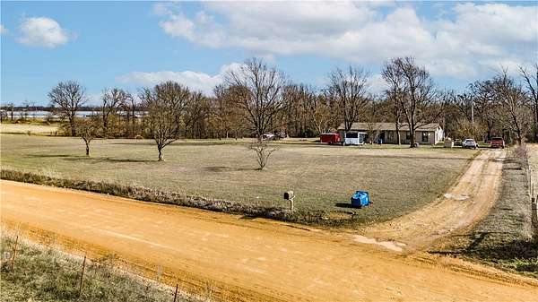 5 Acres of Land with Home for Sale in Gentry, Arkansas