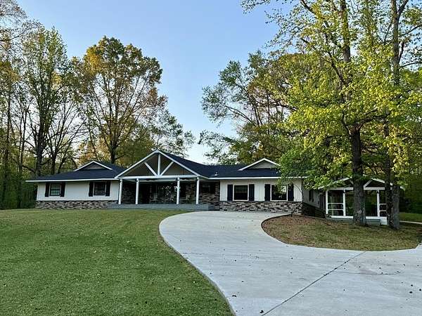 62.7 Acres of Recreational Land with Home for Sale in Charleston, Mississippi