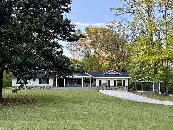 62.7 Acres of Recreational Land with Home for Sale in Charleston, Mississippi