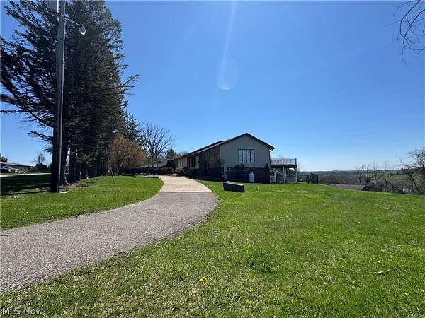 3.89 Acres of Land with Home for Sale in Dillonvale, Ohio