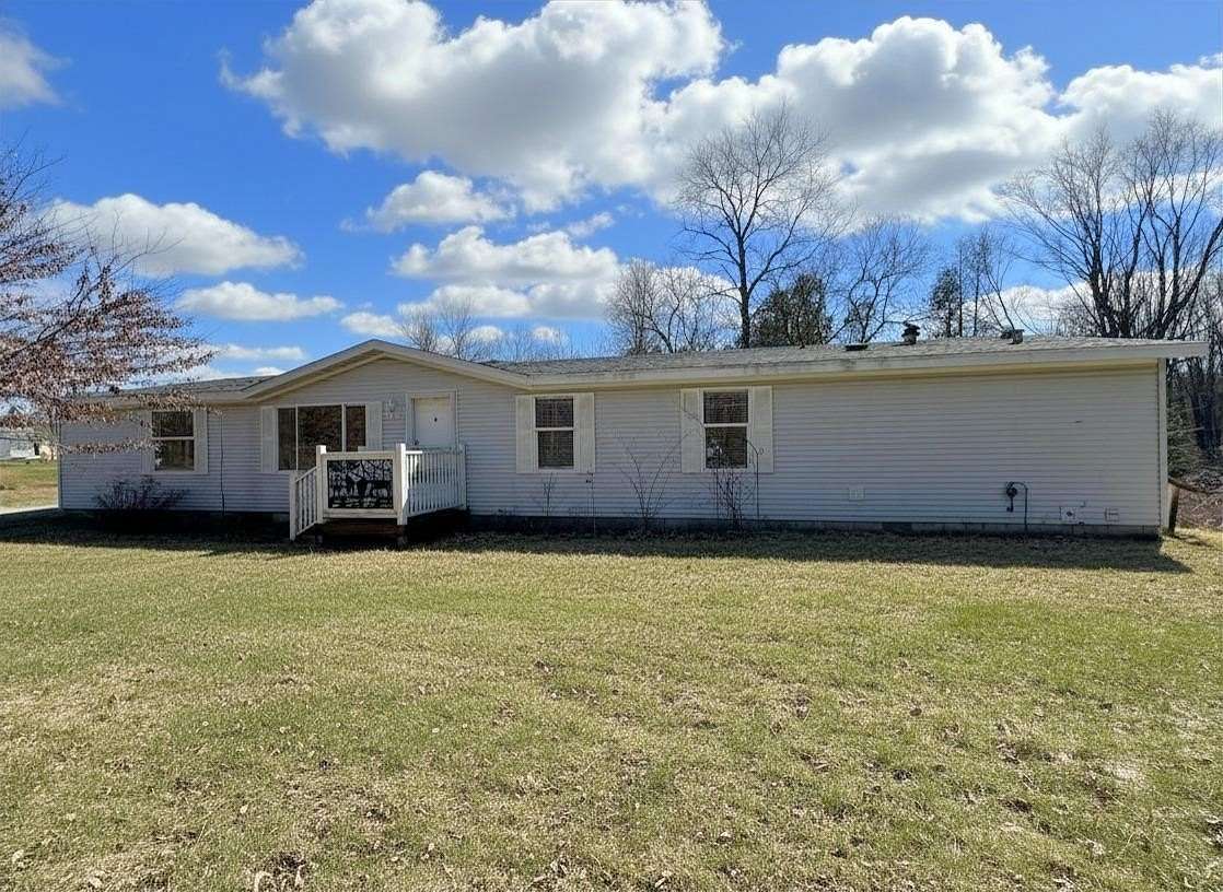 4.59 Acres of Land with Home for Sale in Clare, Michigan