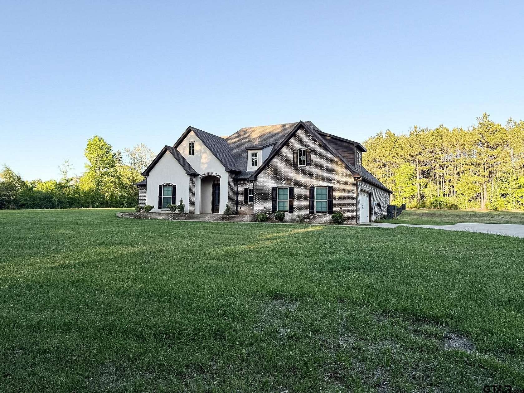 10 Acres of Land with Home for Sale in Jacksonville, Texas