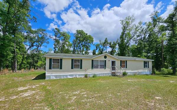 2.2 Acres of Land with Home for Sale in Pinetta, Florida