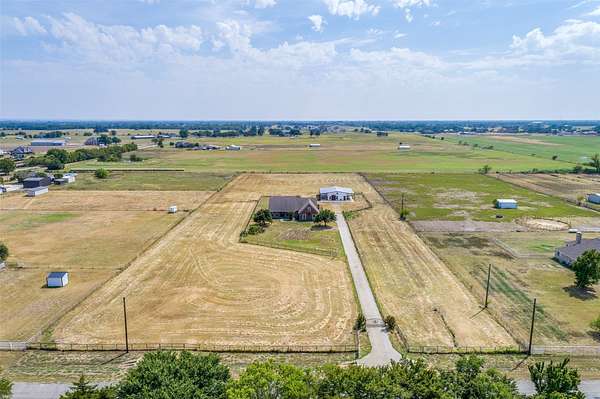 5.26 Acres of Land with Home for Lease in Pilot Point, Texas