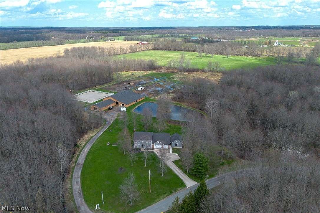 20.4 Acres of Agricultural Land with Home for Sale in Roaming Shores, Ohio