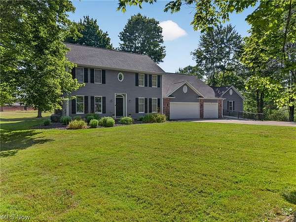 20.4 Acres of Agricultural Land with Home for Sale in Roaming Shores, Ohio