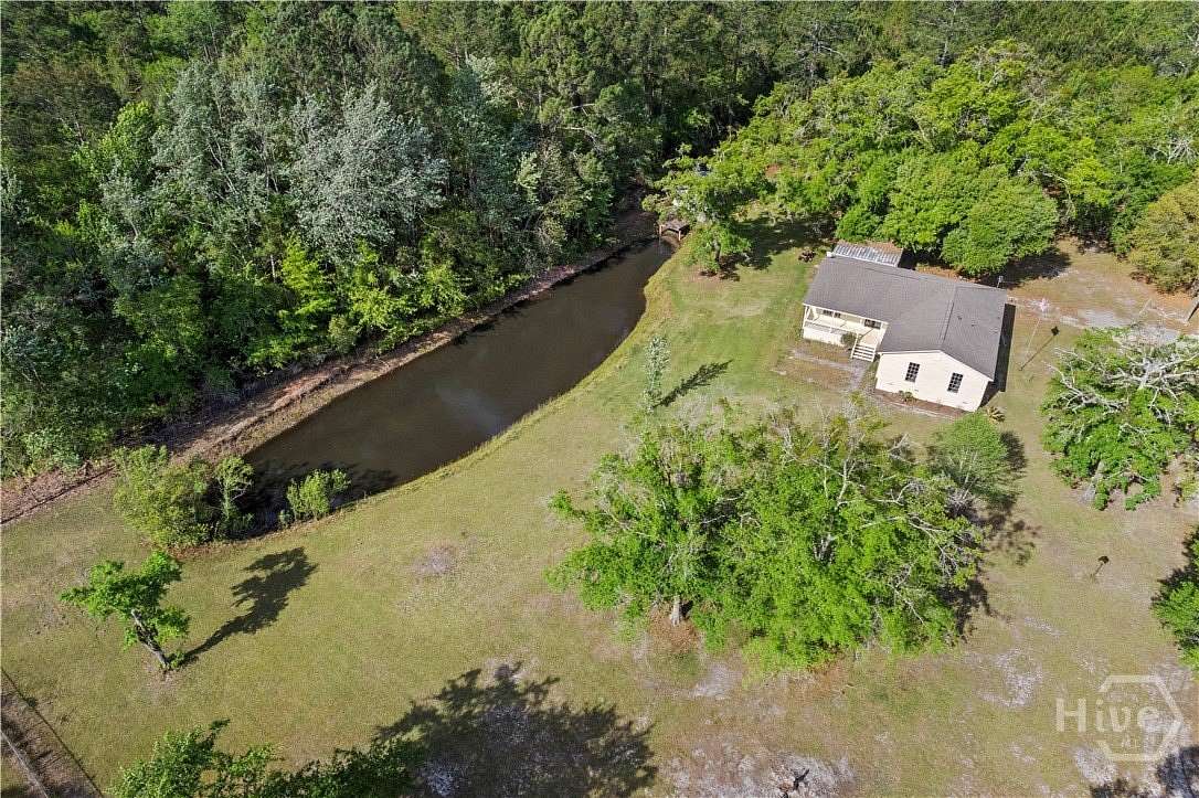 6.53 Acres of Land with Home for Sale in Hinesville, Georgia