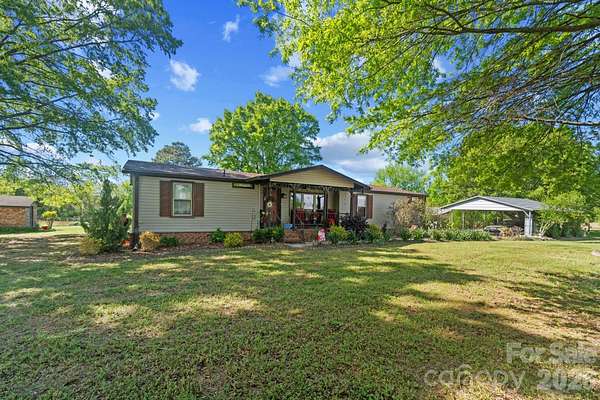 8.35 Acres of Land with Home for Sale in Wingate, North Carolina