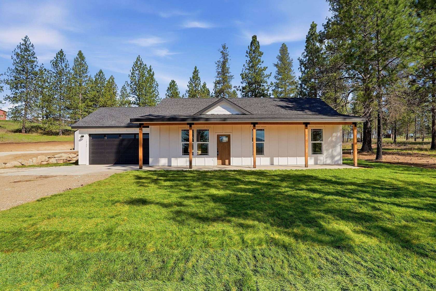 9.9 Acres of Land with Home for Sale in Elk, Washington