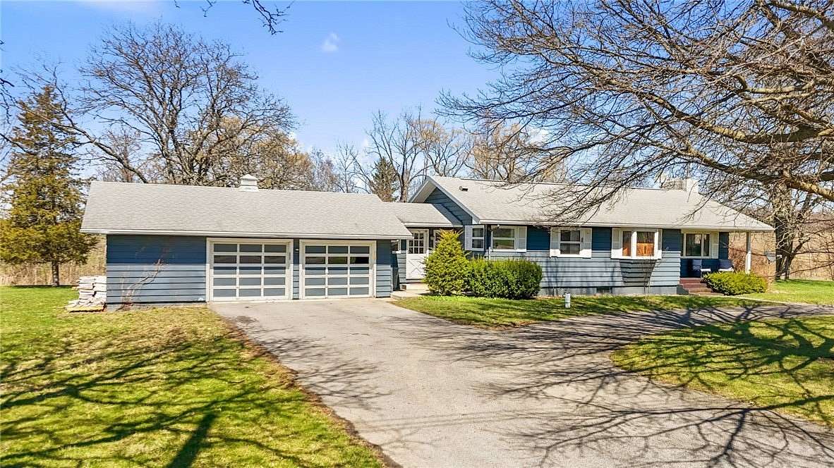 3.28 Acres of Land with Home for Sale in Lansing, New York