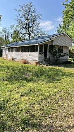 14.2 Acres of Land with Home for Sale in Paragould, Arkansas