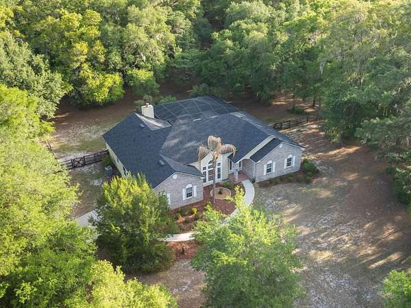 2.47 Acres of Land with Home for Sale in Gainesville, Florida