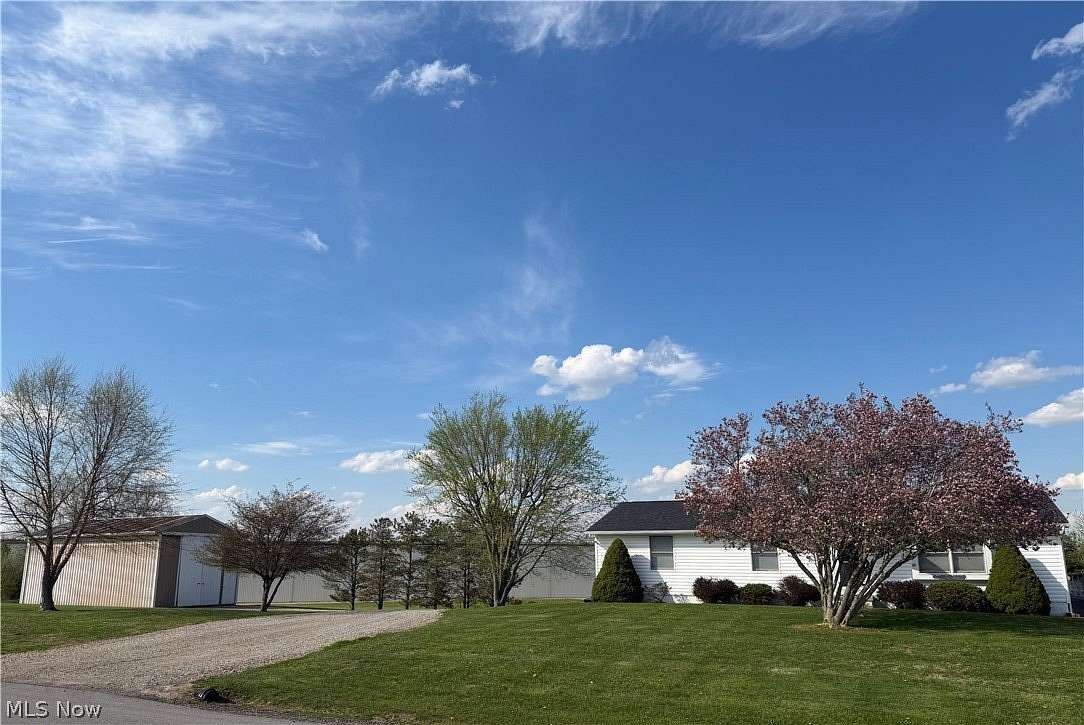 1.69 Acres of Land with Home for Sale in Zanesville, Ohio