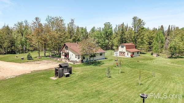 84.4 Acres of Recreational Land with Home for Sale in Rapid River, Michigan